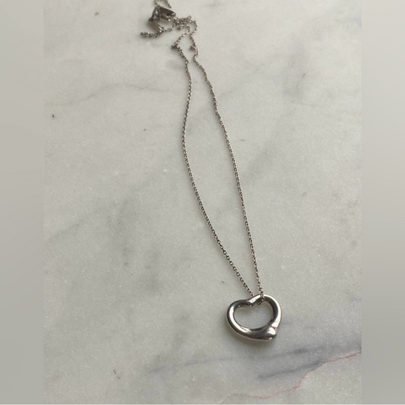 Tiffany & Co. Floating Heart Necklace Sterling Silver 925
16 inch chain - Picture 9 of 9
